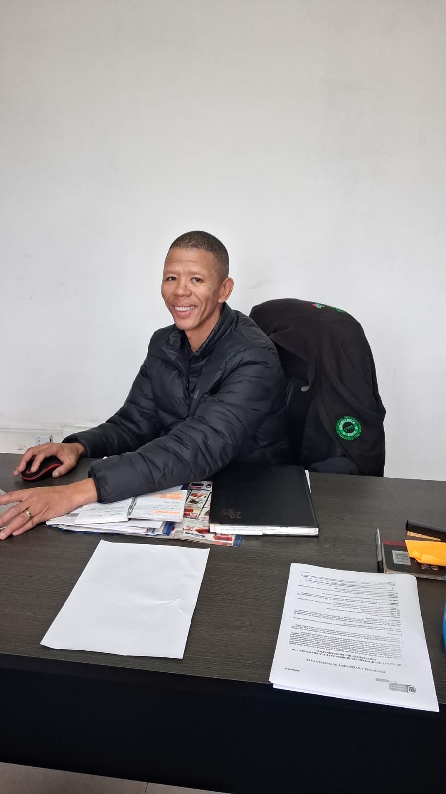 Deon Lotz, director and owner of DTL Mechanical Repairs, at his desk in the Somerset West office